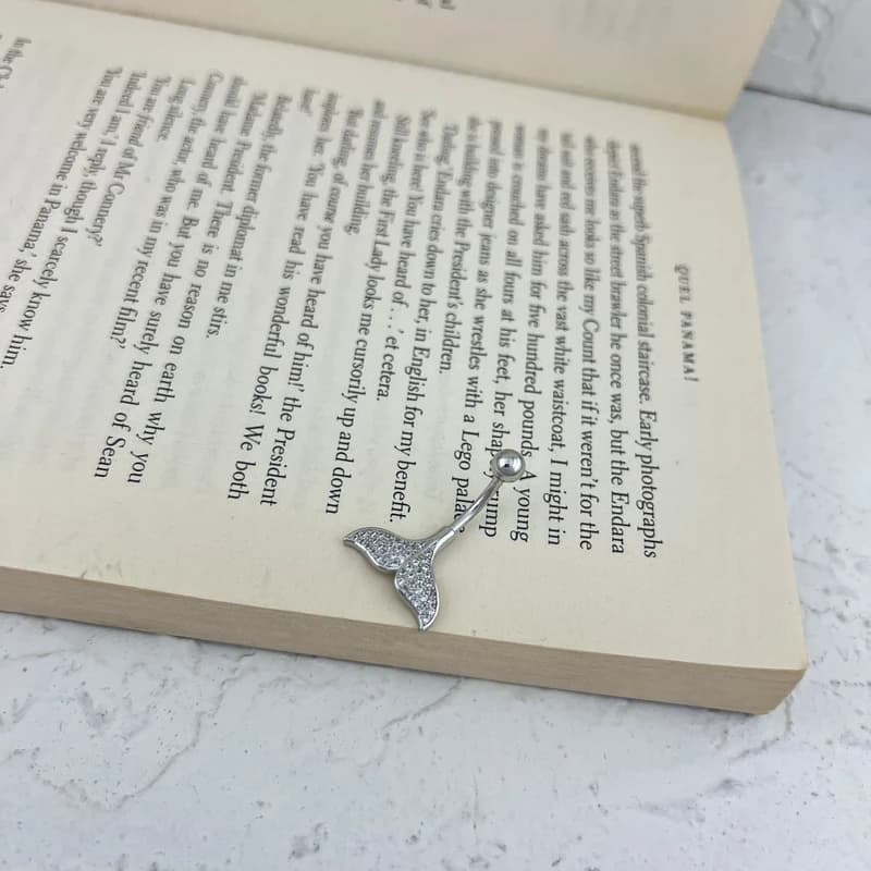 پیرسینگ ناف طرح دم وال — تصویر ۳