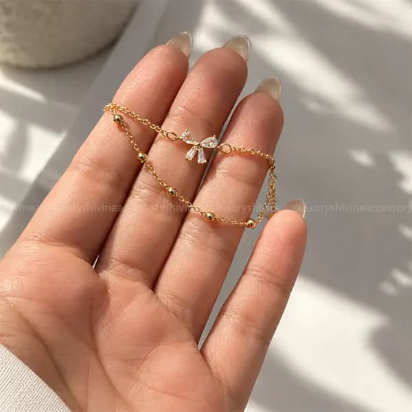 دستبند زنانه وای اس ایکس طرح طلا — تصویر ۲