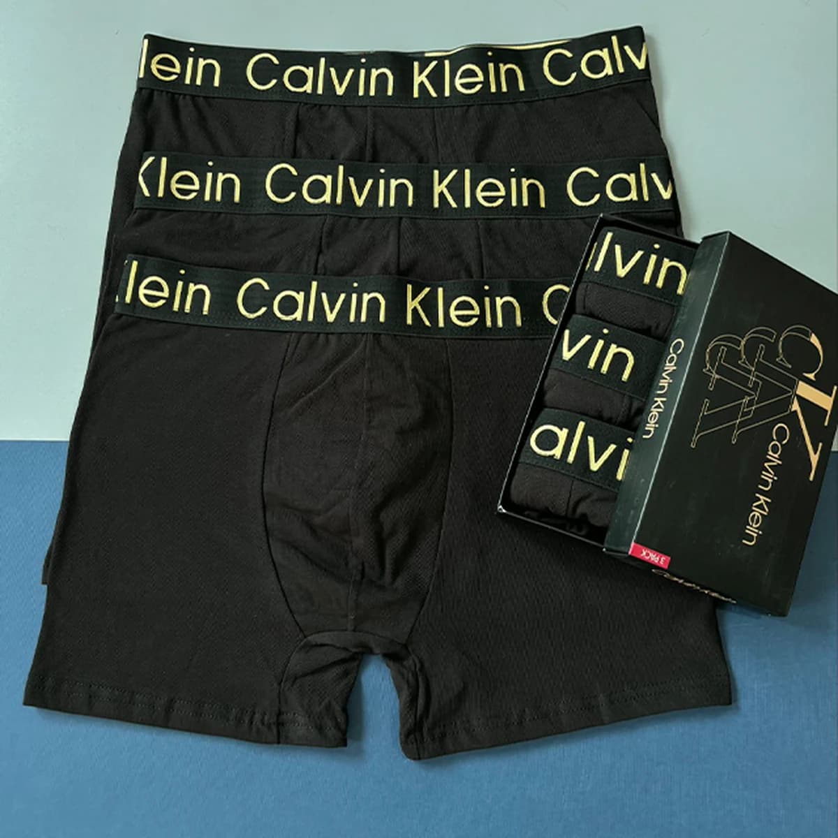 شورت نیم پا مردانه پک 3 عددی Calvin Klein کش کمر طلایی