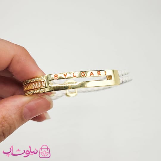 دستبند زنانه بولگاری مدل چرم استیل نارنجی سفید طلایی کیفیت مستر کد 1600 — تصویر ۲
