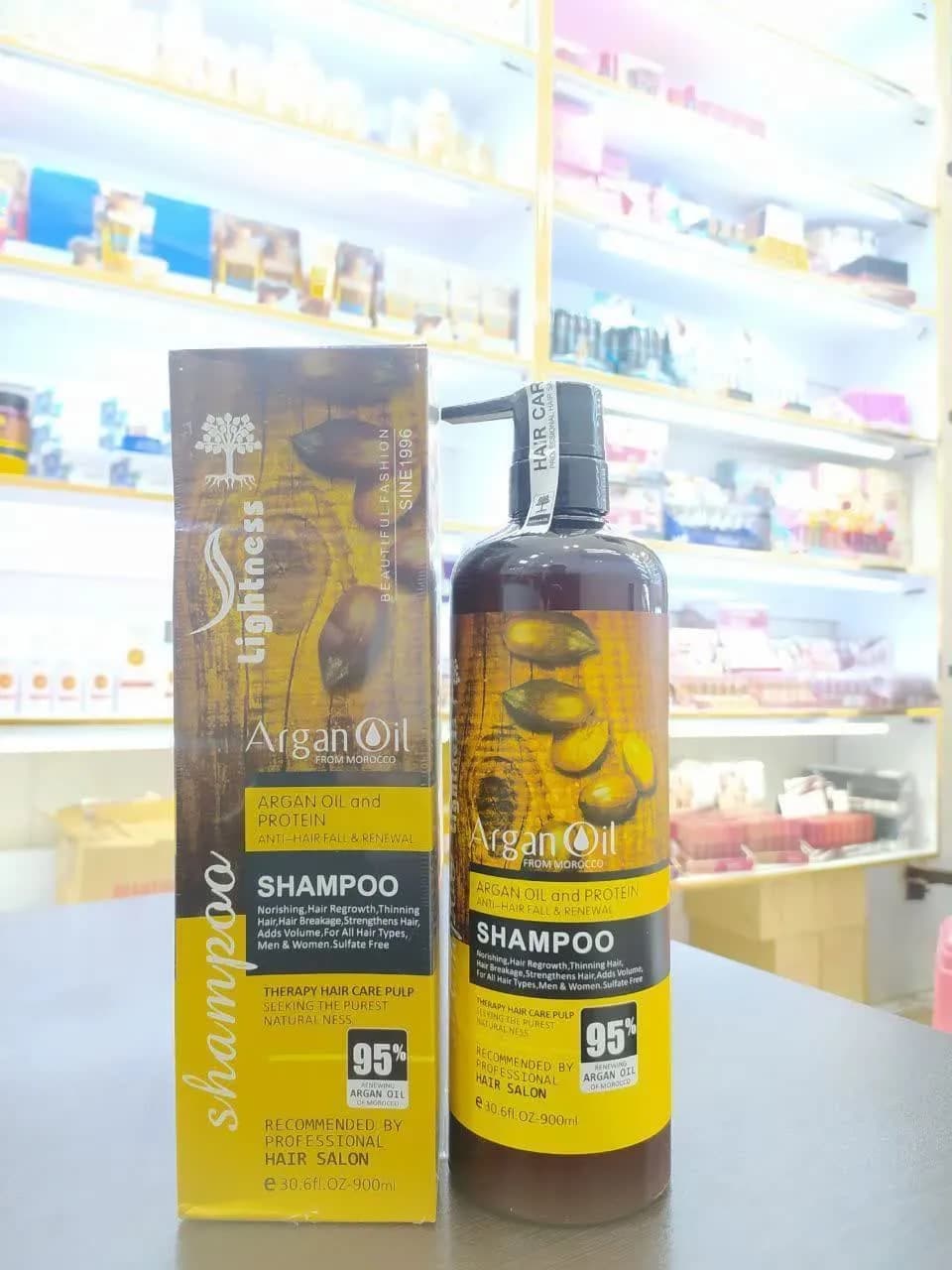شامپو لایتنس عصاره روغن آرگان حجم 900 میل اصلی