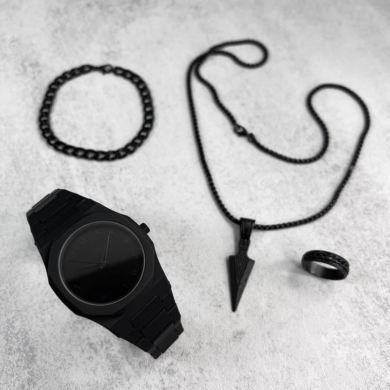 ست ساعت مچی عقربه‌ای کوارتز و دستبند مردانه مدل carbon 314 به همراه گردنبند و انگشتر — تصویر ۳