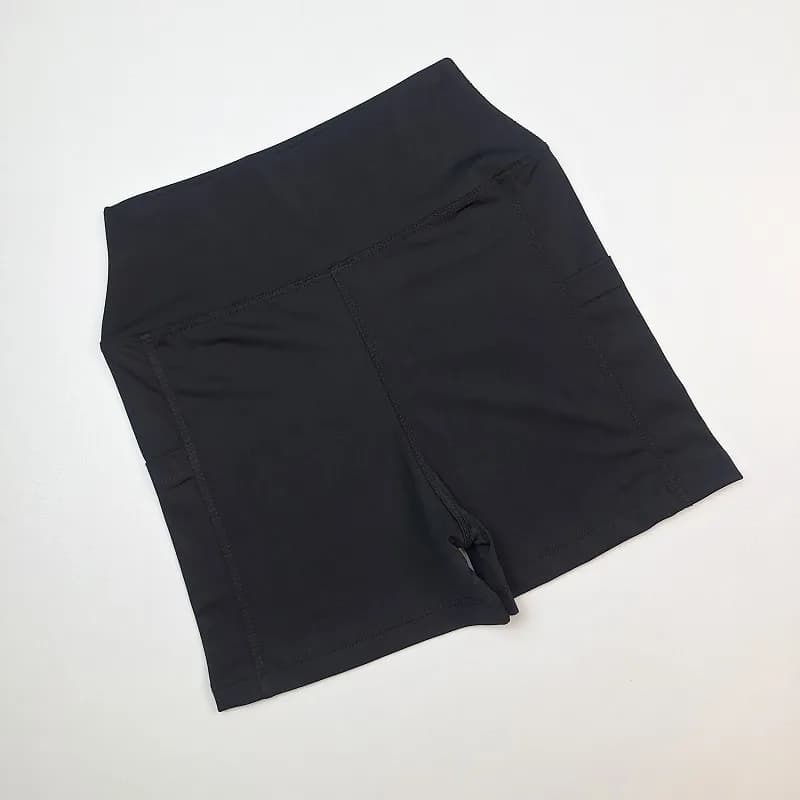 شورتک ورزشی زنانه جیب دار نایک SH31 — تصویر ۴