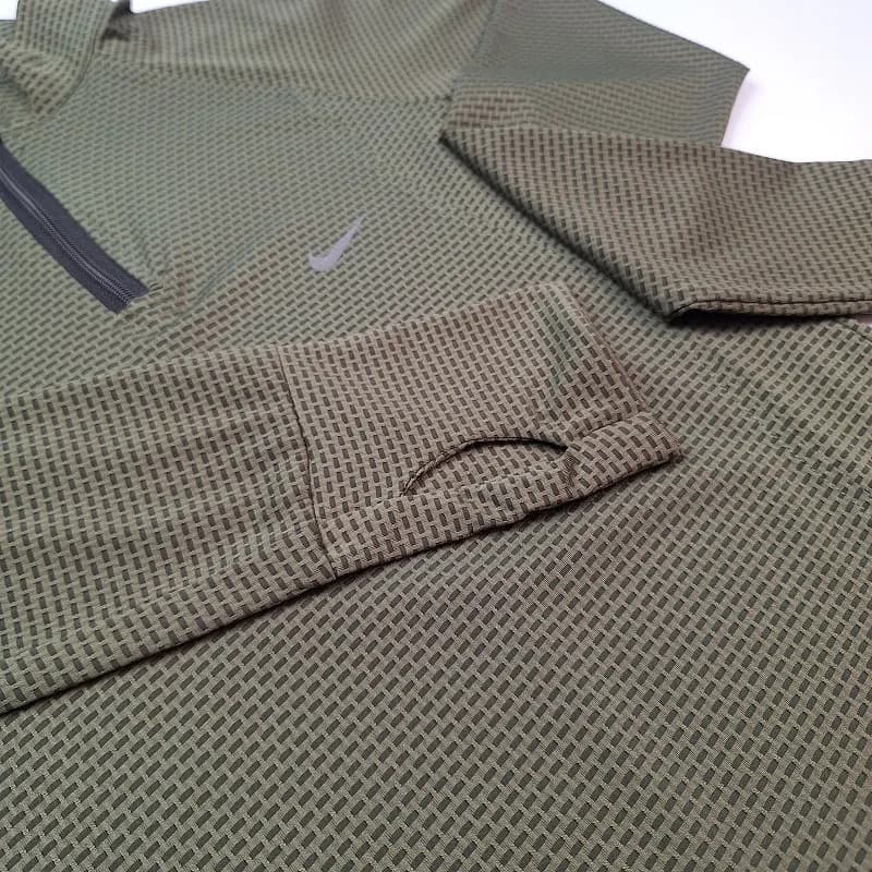 تیشرت ورزشی زنانه نیم زیپ فینگری نایک T2957 — تصویر ۵