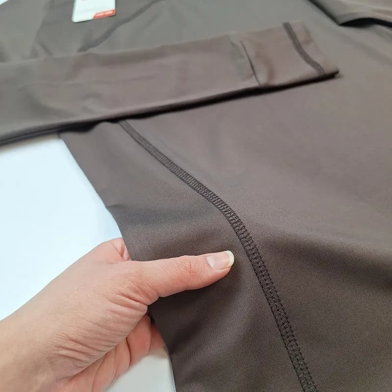 تیشرت فینگری نیم زیپ ورزشی زنانه نایک T-F64 — تصویر ۶