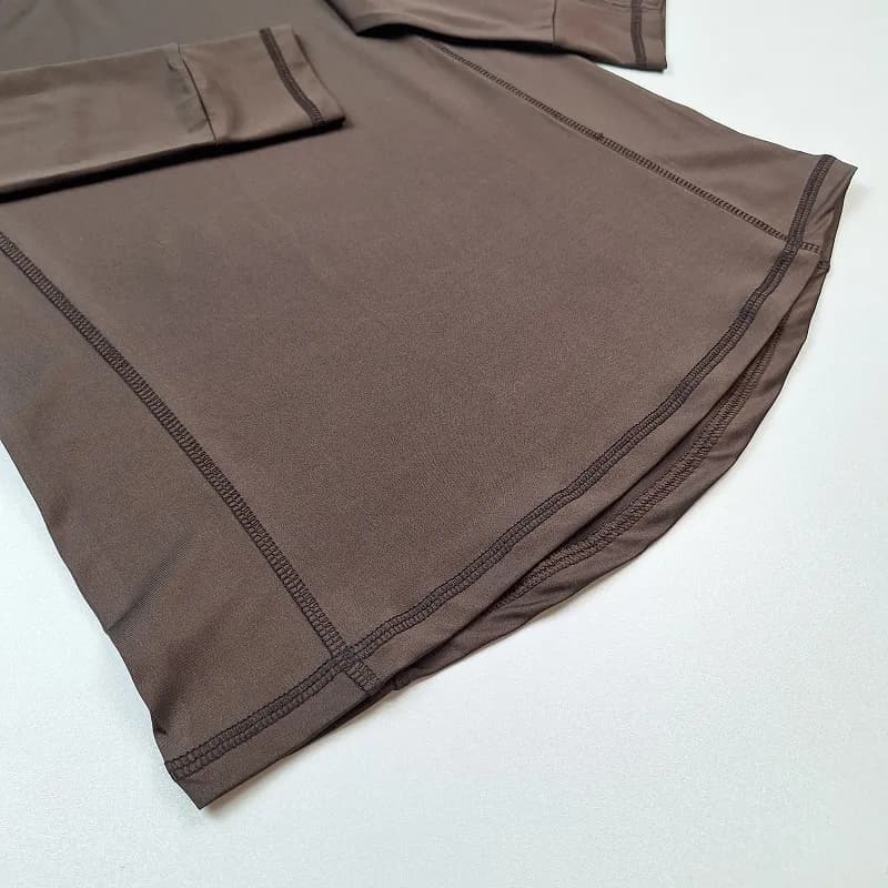 تیشرت فینگری نیم زیپ ورزشی زنانه نایک T-F64 — تصویر ۴
