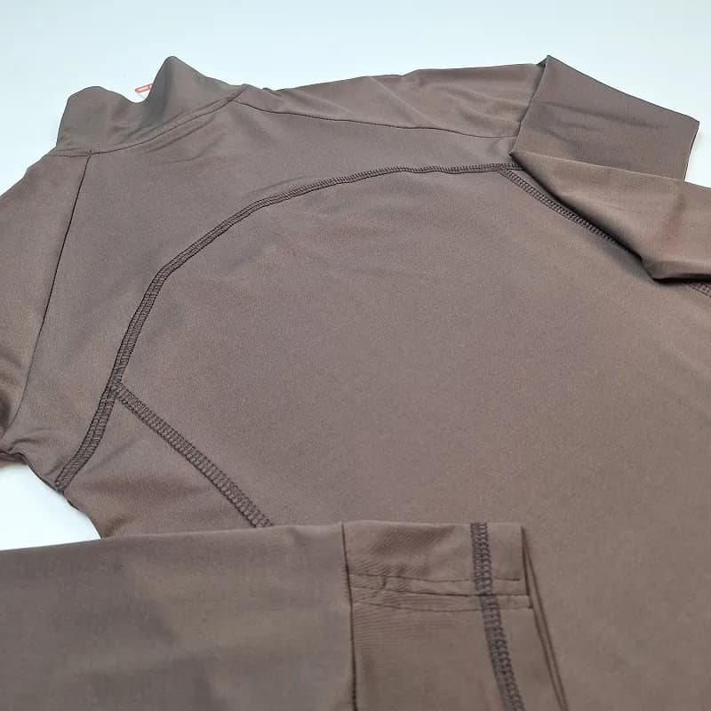تیشرت فینگری نیم زیپ ورزشی زنانه نایک T-F64 — تصویر ۸