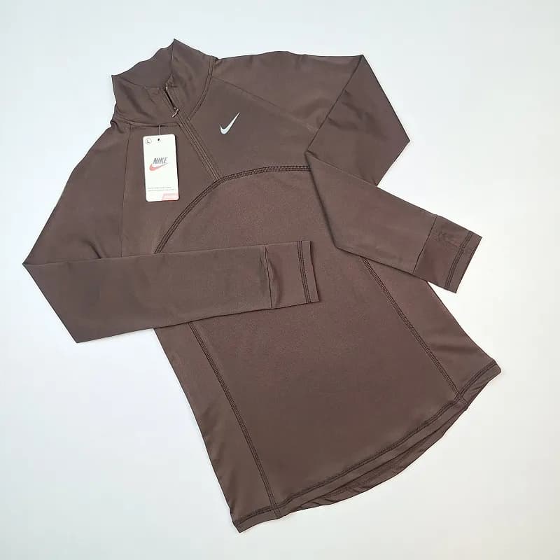 تیشرت فینگری نیم زیپ ورزشی زنانه نایک T-F64 — تصویر ۲