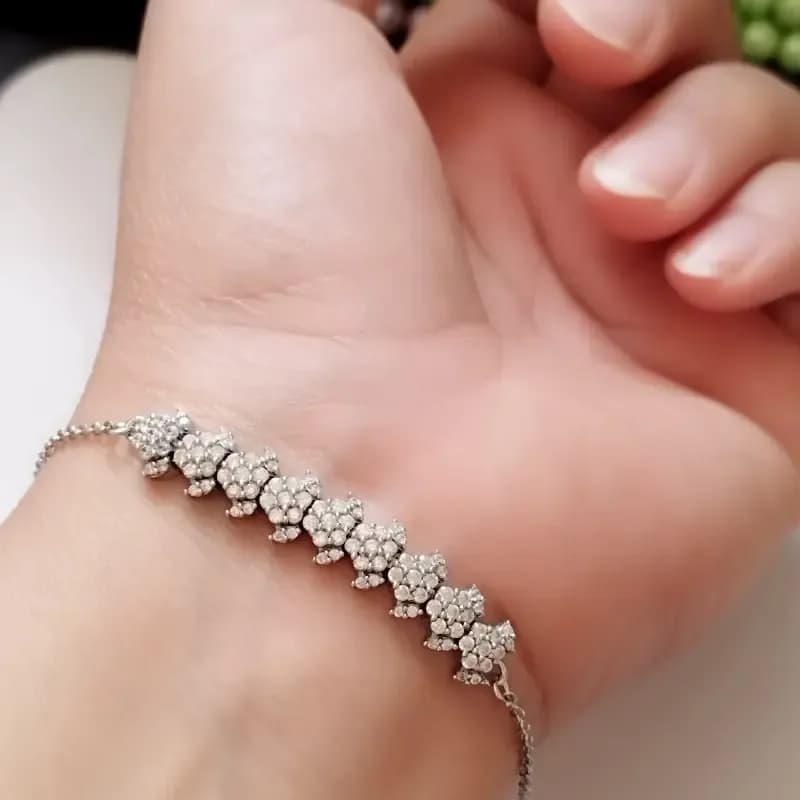 دستبند نقره زنانه عیار 925 طرح جواهری روکش طلا سفید وزن 4.49 گرم — تصویر ۱۰