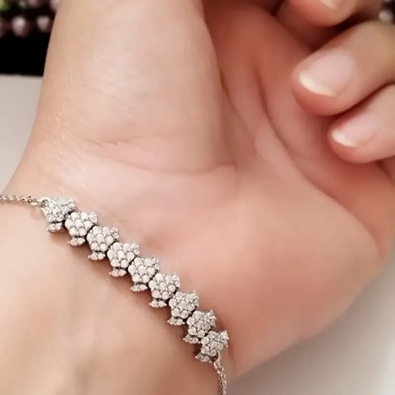 دستبند نقره زنانه عیار 925 طرح جواهری روکش طلا سفید وزن 4.49 گرم — تصویر ۹