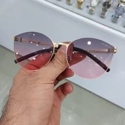عینک آفتابی زنانه مدل گربه ای مارک آیس برلین فریم تیتانیوم نشکن(رنگ هلویی) — تصویر ۲