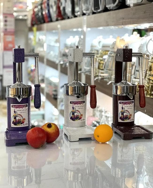 آب گیری مرکبات دستی