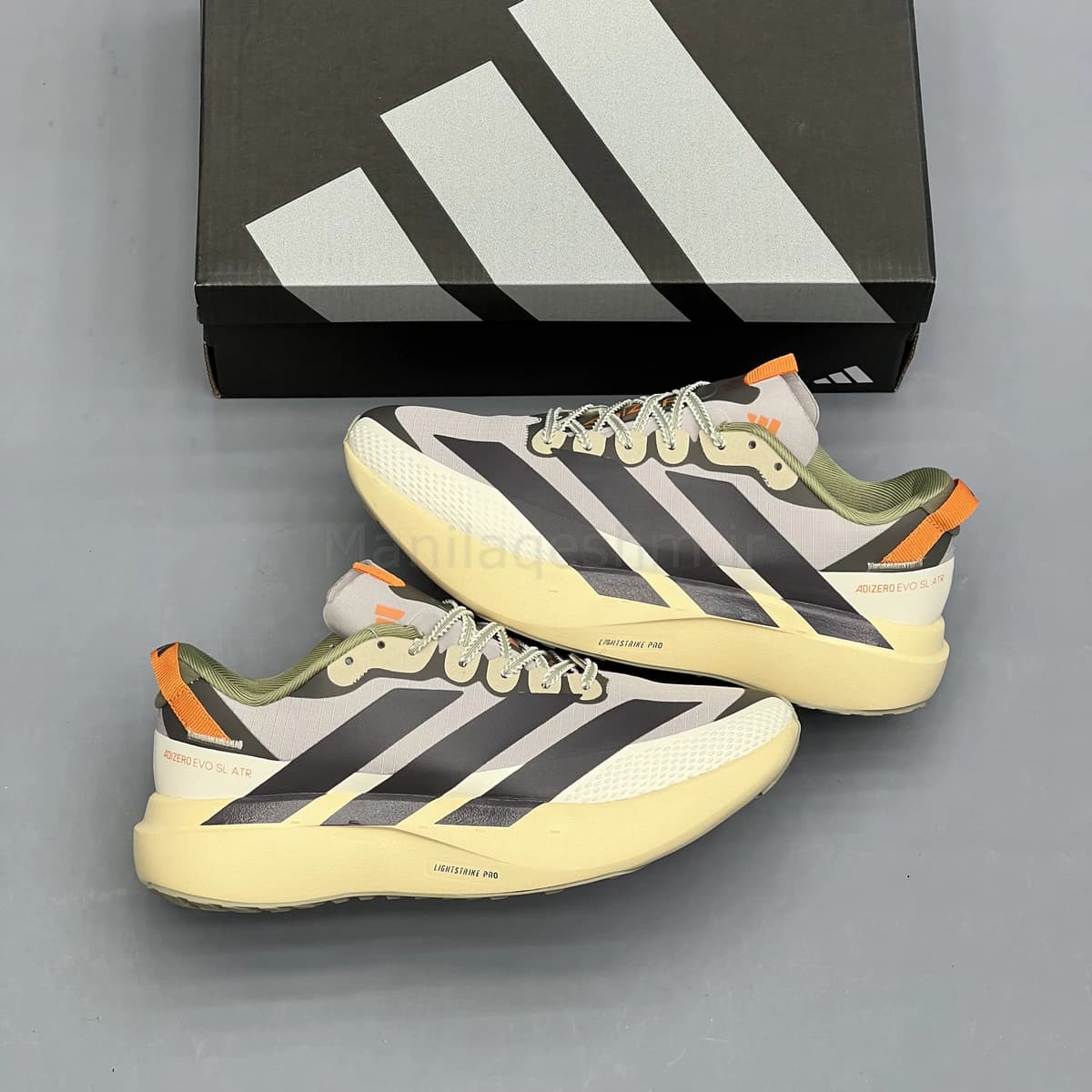 کفش آدیداس آدی زیرو طوسی کرم Adidas Adizero Evo SL ATR