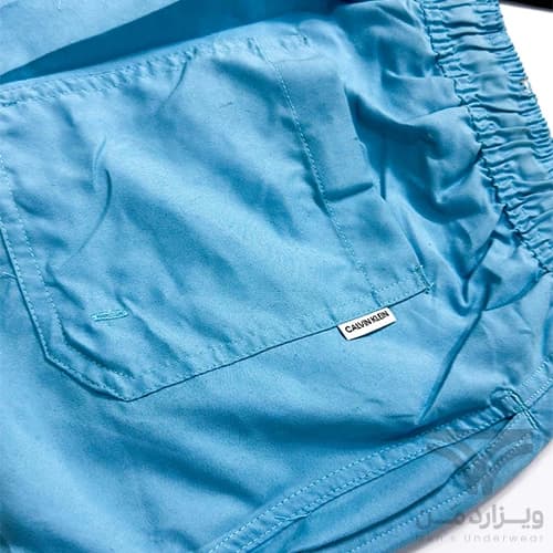 شلوارک سونایی و مایو مردانه اورجینال وارداتی برند Calvin Klein کلوین کلاین آستردار آبی روشن — تصویر ۴