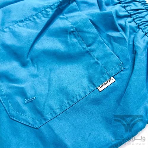 شلوارک سونایی و مایو مردانه اورجینال وارداتی برند Calvin Klein کلوین کلاین آستردار سبزآبی — تصویر ۴