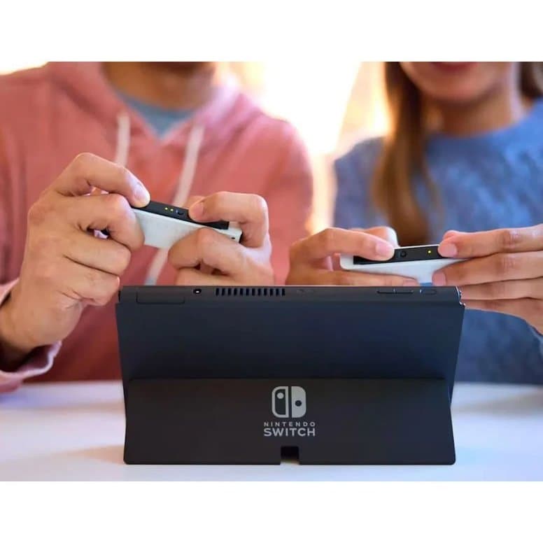کنسول بازی نینتندو Switch OLED هیبریدی آبی قرمز — تصویر ۷