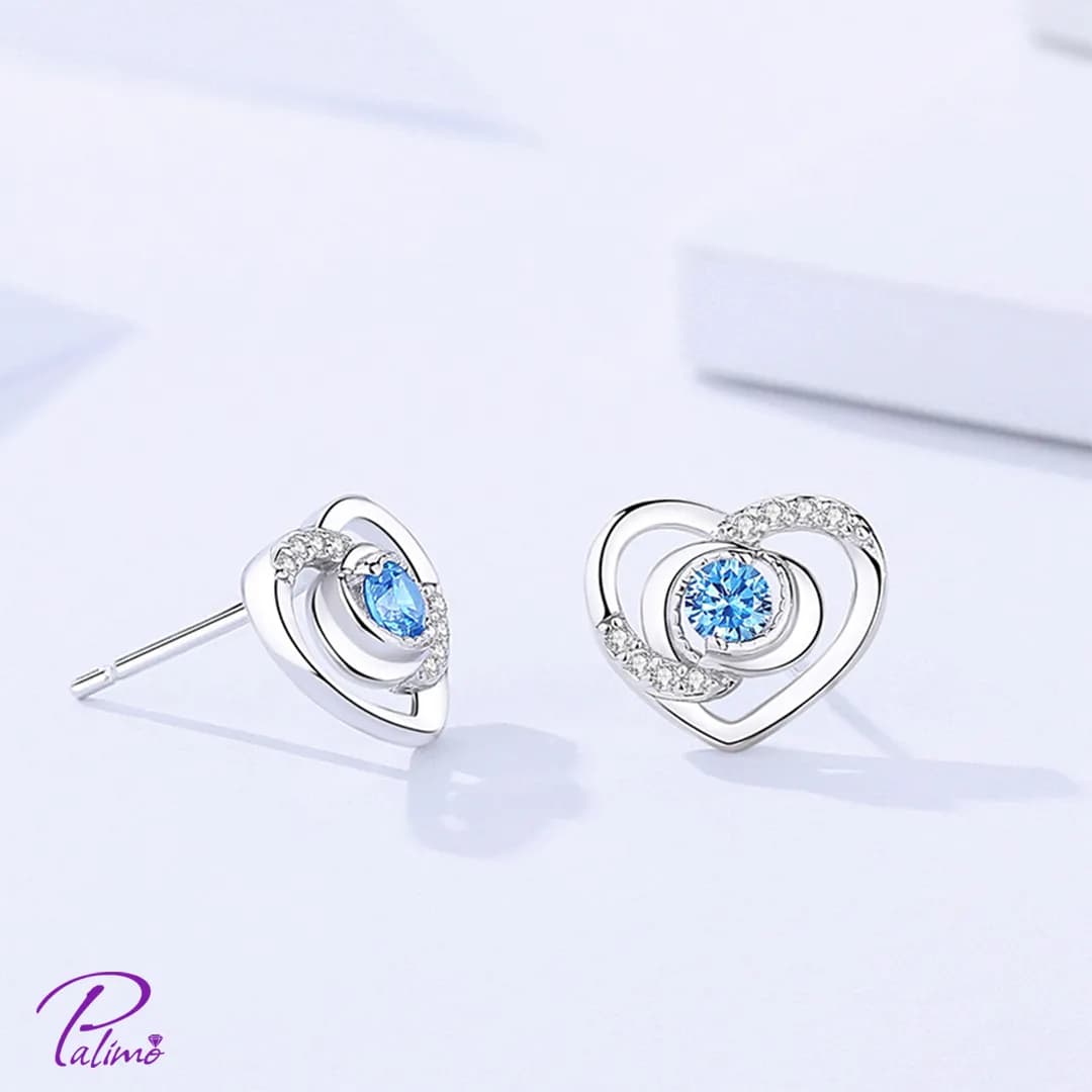 گوشواره نقره قلب نگین آبی E2125 با روکش طلای سفید — تصویر ۳