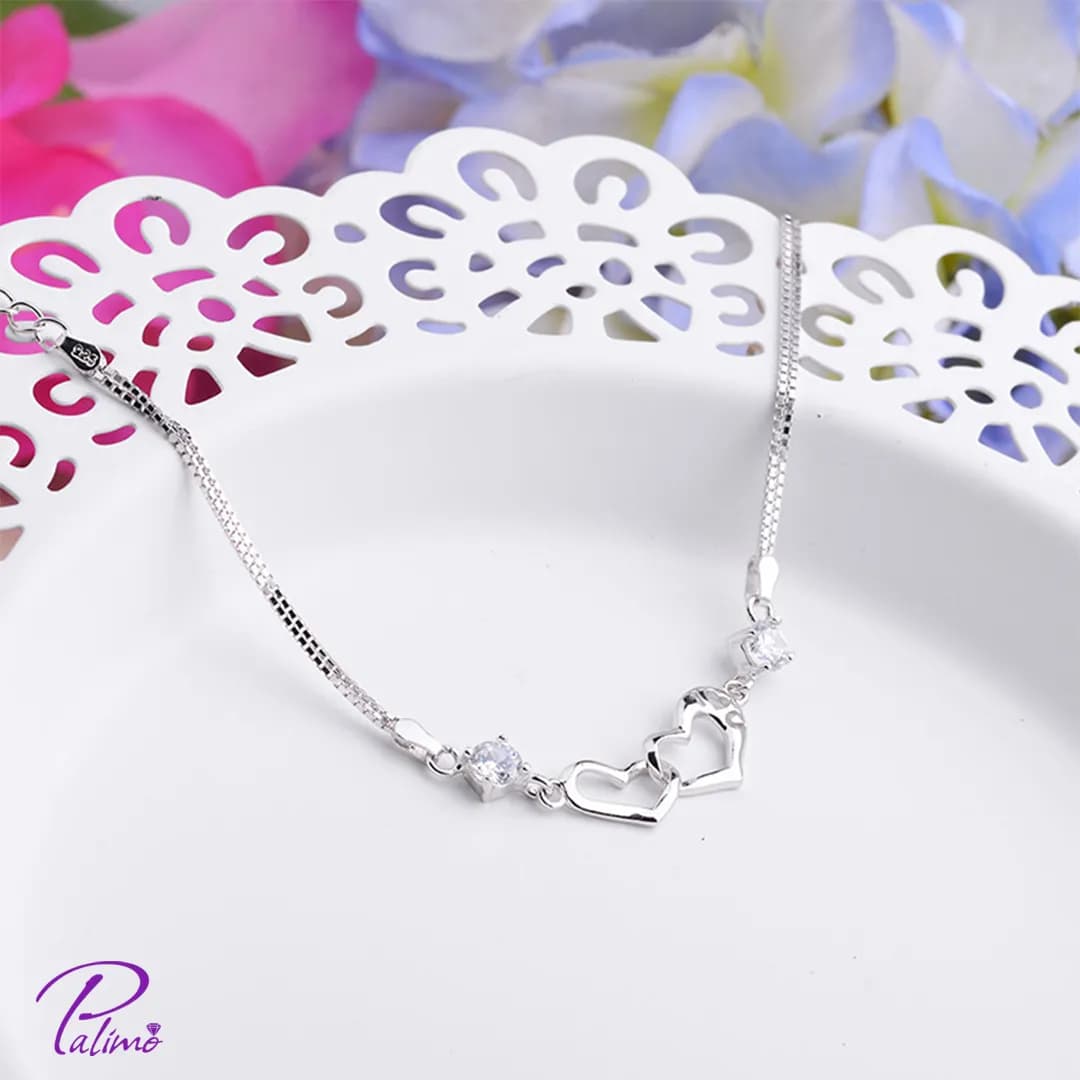 دستبند نقره دو قلب در هم B2160 با روکش طلای سفید — تصویر ۳