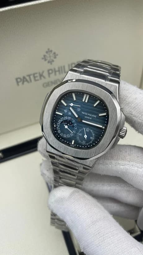 ساعت مچی پتک فیلیپ ناتیلوس | Patek Philippe Nautilus | نقره ای صفحه آبی کوک دستی رپلیکا ایتالیا — تصویر ۲