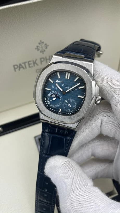 ساعت مچی پتک فیلیپ ناتیلوس | Patek Philippe Nautilus | نقره ای صفحه آبی کوک دستی رپلیکا ایتالیا — تصویر ۳