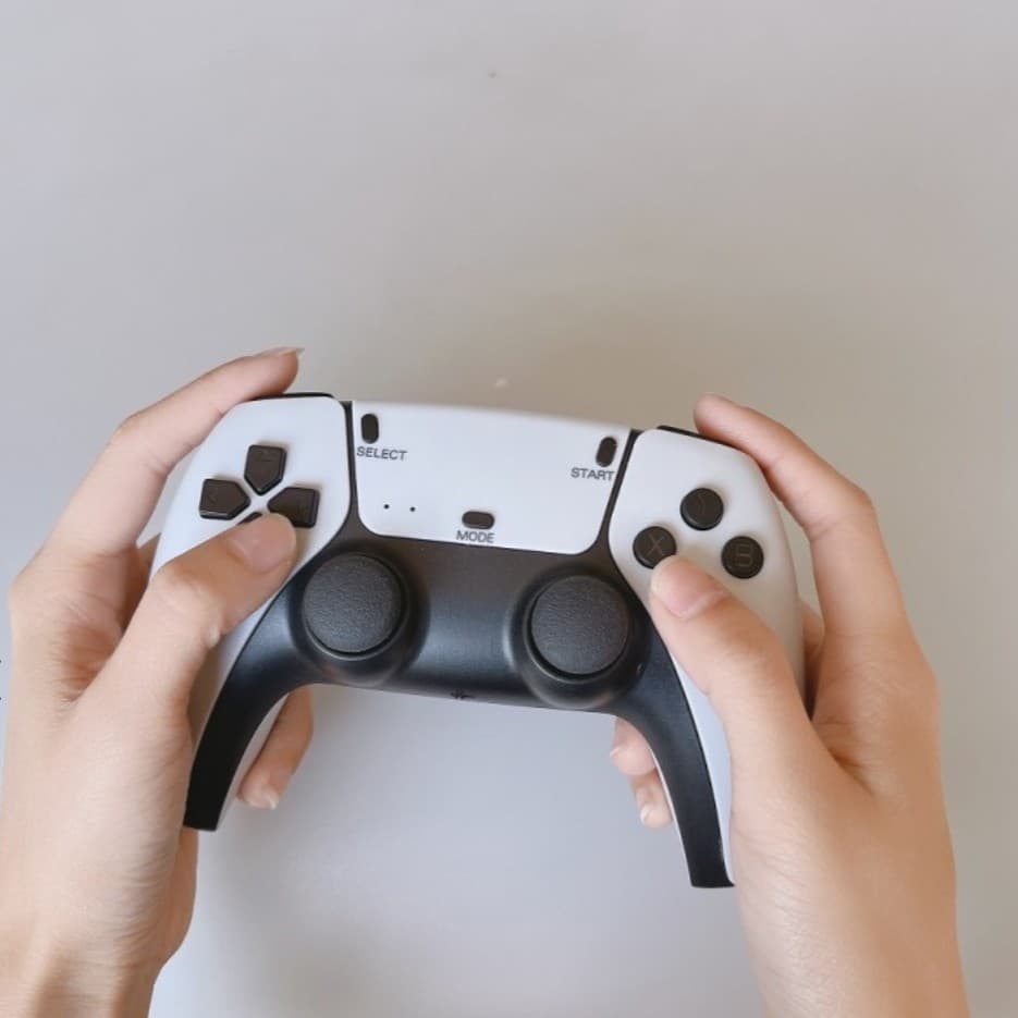 کنسول بازی مدل Game Stick 4K Ultra Pro طرح گیم پد PS5 — تصویر ۲