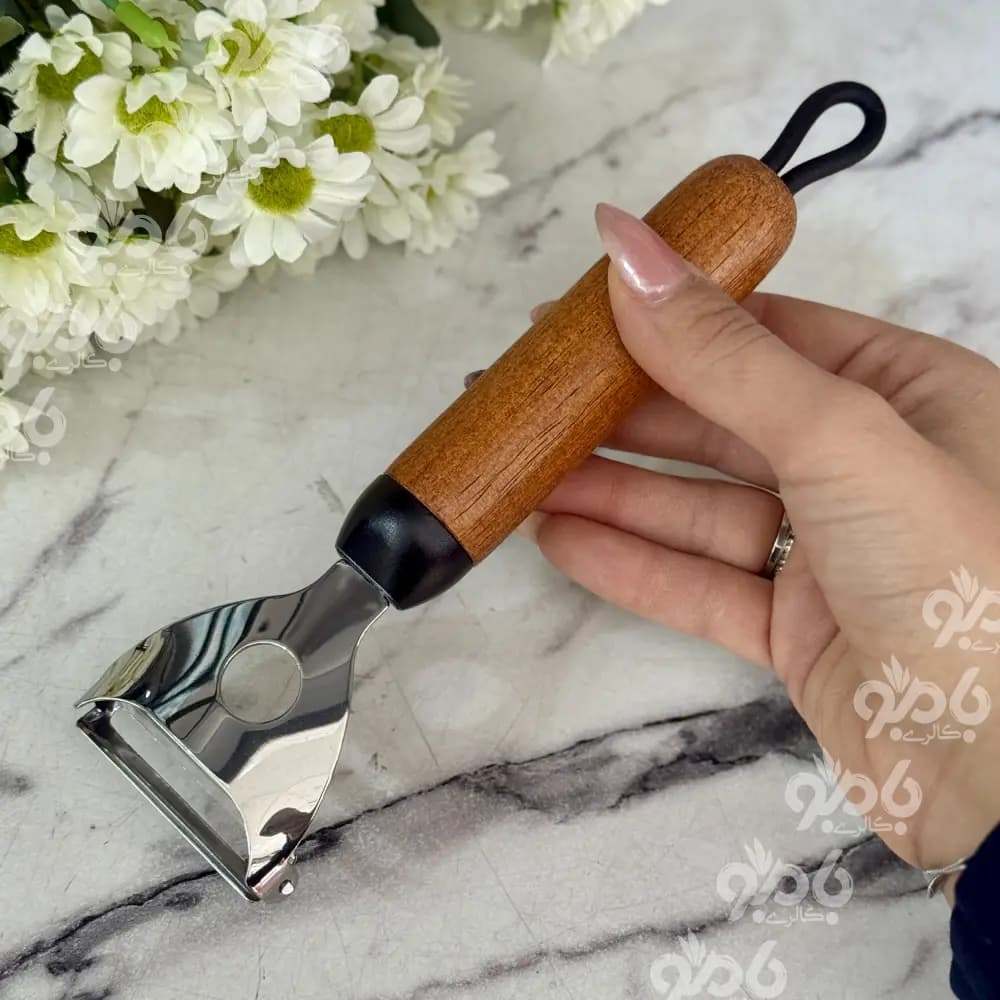 پوست کن استیل دسته چوب موموD38
