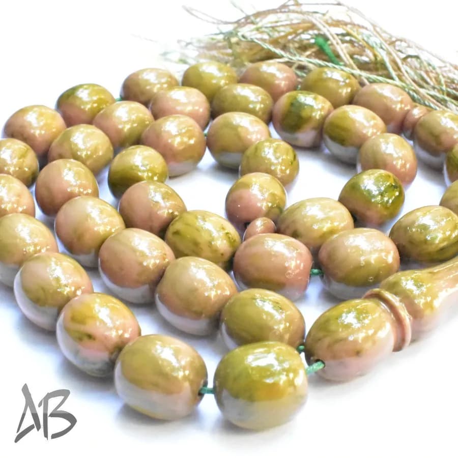 تسبیح سندلوس 41 دانه بودار تراش بیضی طرح دار و زیبا کد 1095 آقابزرگ — تصویر ۹