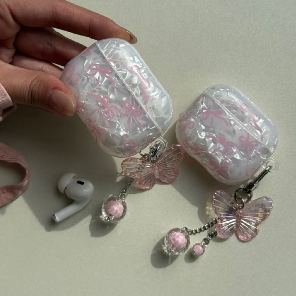 کاور ایرپاد یخی پاپیونی به همراه آویز مناسب برای اپل ایرپاد Apple AirPods 1 / 2 / 3 / 4 / Pro / Pro 2 — تصویر ۴