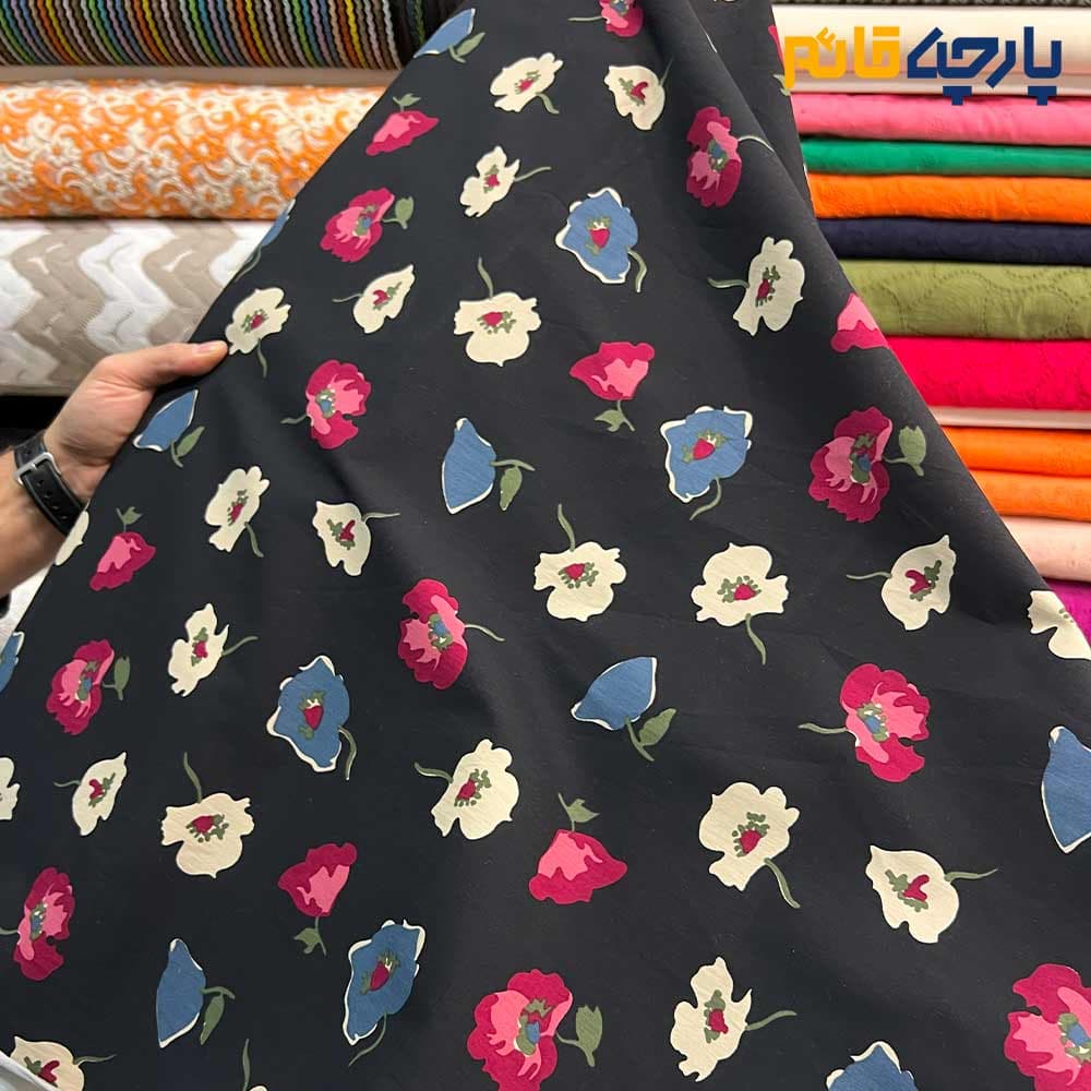پارچه بهاره و تابستانه کتان نخ کره ای طرحدارمشکی گل طرح نقاشی رنگی کد5577