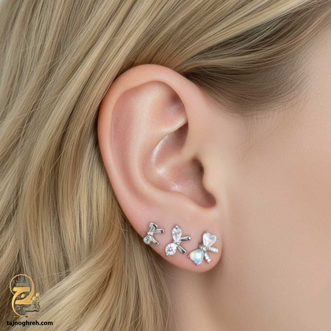 گوشواره نقره میخی سه جفتی پاپیون و صدف مدل ESW E53