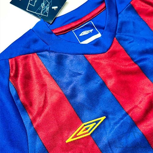 بلوز آستین دار ورزشی پسرانه فوتبالی برند آمبرو Umbro اورجینال وارداتی آبی اناری — تصویر ۳