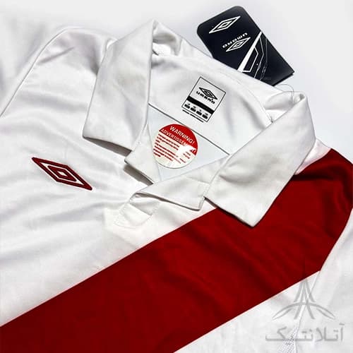 بلوز آستین دار ورزشی پسرانه فوتبالی برند آمبرو Umbro اورجینال وارداتی سفید قرمز — تصویر ۲