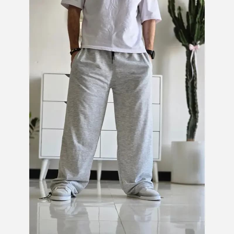 شلوار اسلش جاگر کلوین کلوین پارچه ملانژ دمپا گت دار سایز XXL XXXL طوسی مشکی برفی — تصویر ۳