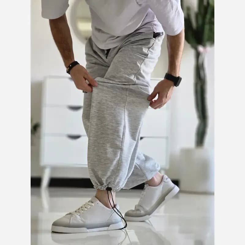 شلوار اسلش جاگر کلوین کلوین پارچه ملانژ دمپا گت دار سایز XXL XXXL طوسی مشکی برفی — تصویر ۲