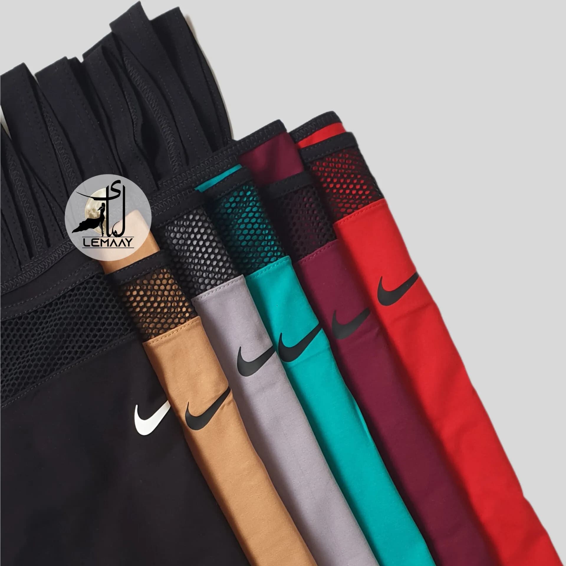 ست تاپ وشورتک ورزشی NIKE — تصویر ۲