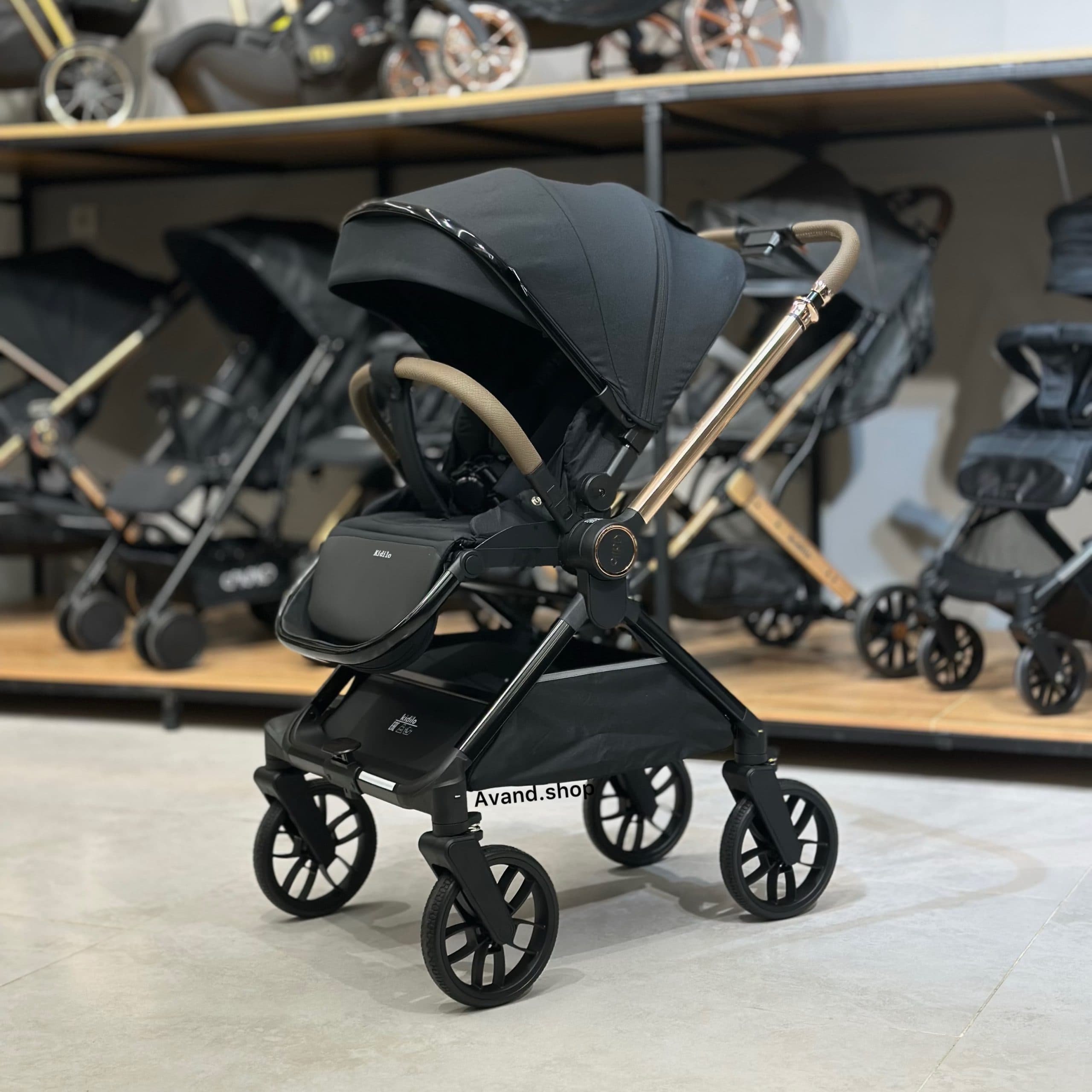 کالسکه کیدیلو مدل D900 دسته دوطرفه و چهار چرخ 360 درجه