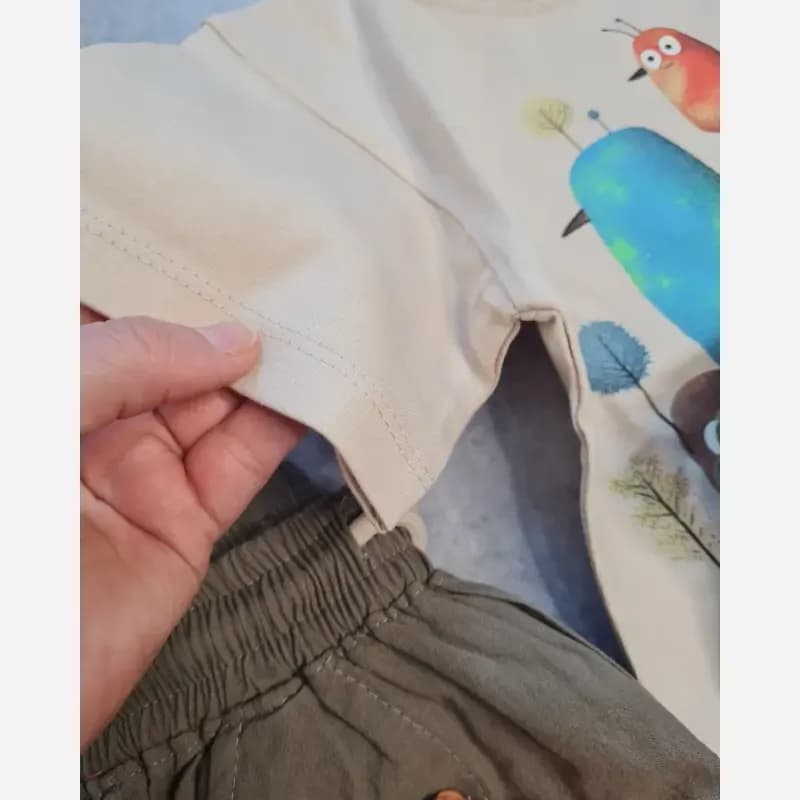ست تیشرت باکسی و شلوارک کتان بچگانه طرح کلبه حیوانات — تصویر ۷