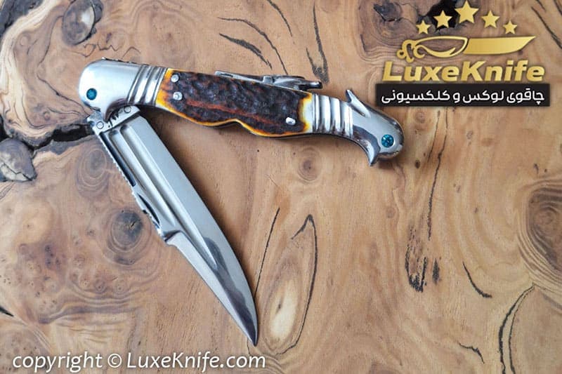 چاقوی جیبی کلکسیونی طرح دو سر طوطی تیغه بادامی — تصویر ۶