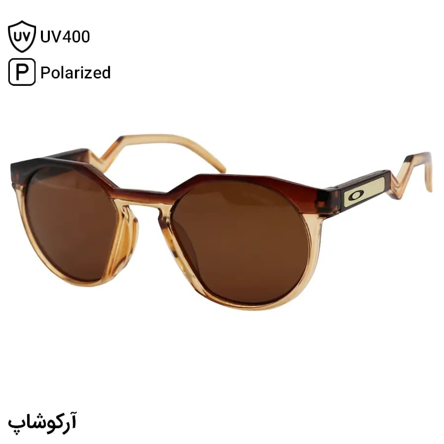 عینک ورزشی OAKLEY با فریم رنگ قهوهای و عسلی براق، شکل گرد و لنز قهوهای تیره و پلاریزه مدل 009242A