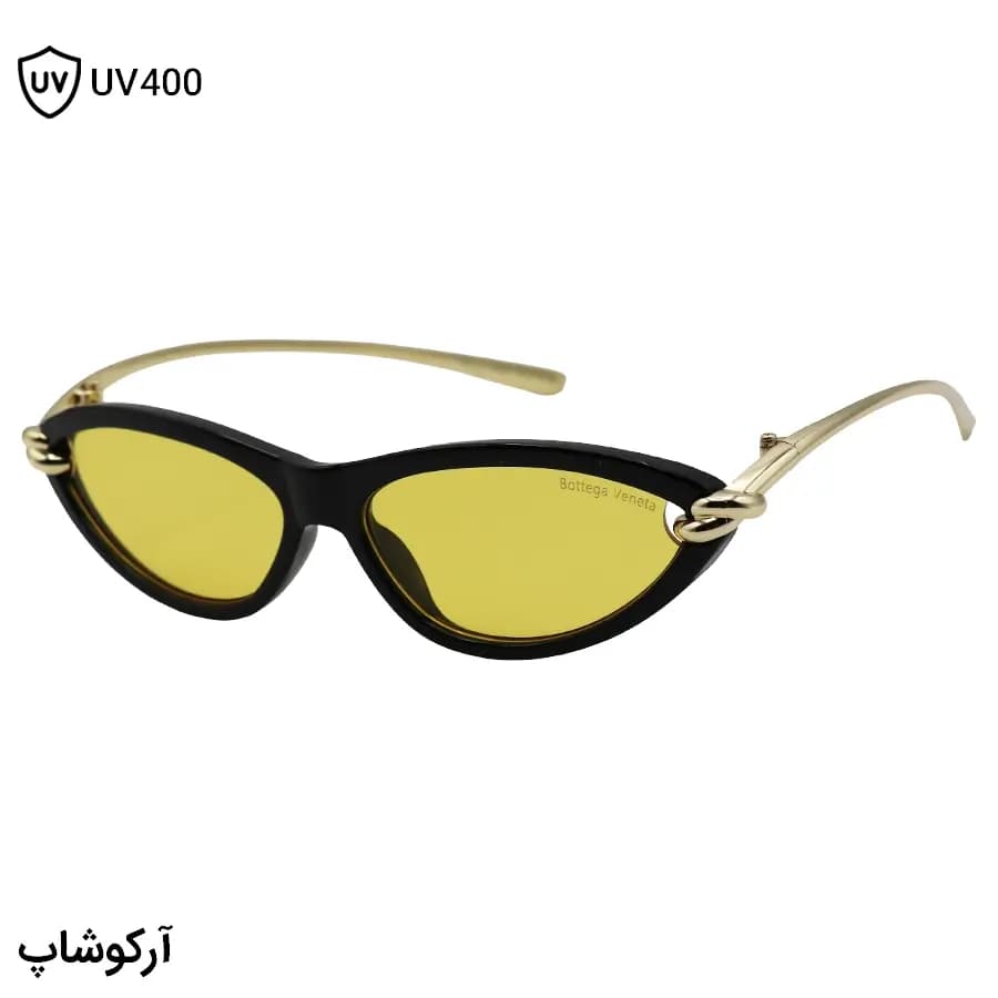 عینک شب زنانه Bottega Veneta با فریم چشم گربه‌ای، رنگ مشکی براق، دسته طلایی و لنز زرد رنگ مدل 9697