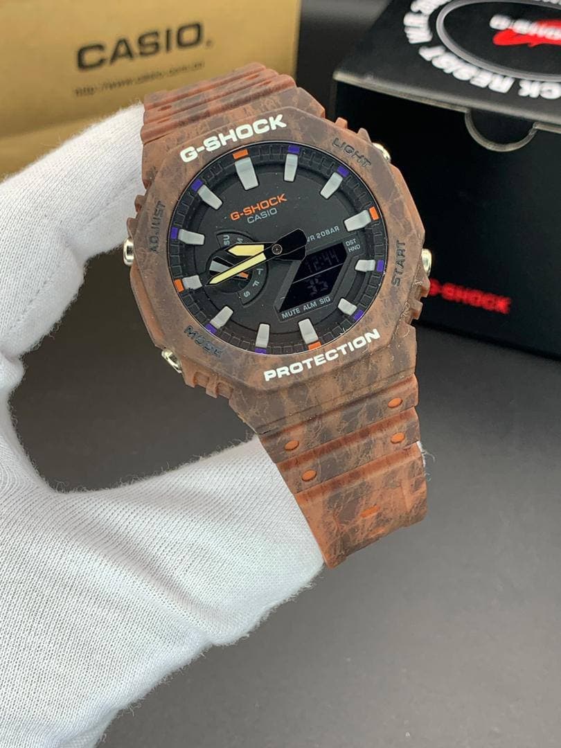 ساعت مچی کاسیو جیشاک مدل GA-2100 صفحه مشکی بند قهوه ای