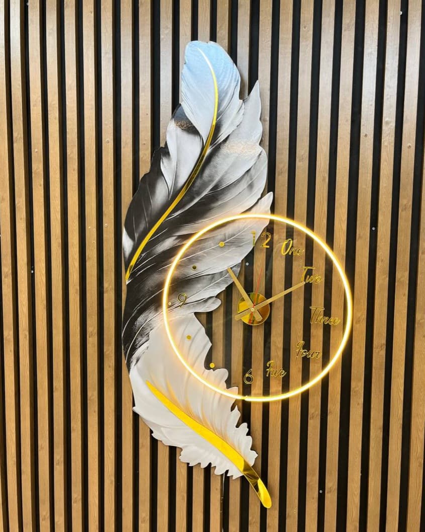 ساعت دیواری طرح پر طوسی