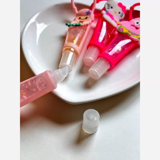 برق لب تیوپی آویز دار برق لب خیس و براق کسوت فانتزی پینترستی کیتی پاتریک خوشبو خوشمزه دارای آویز کیف جاکلیدی جاسویچی — تصویر ۳