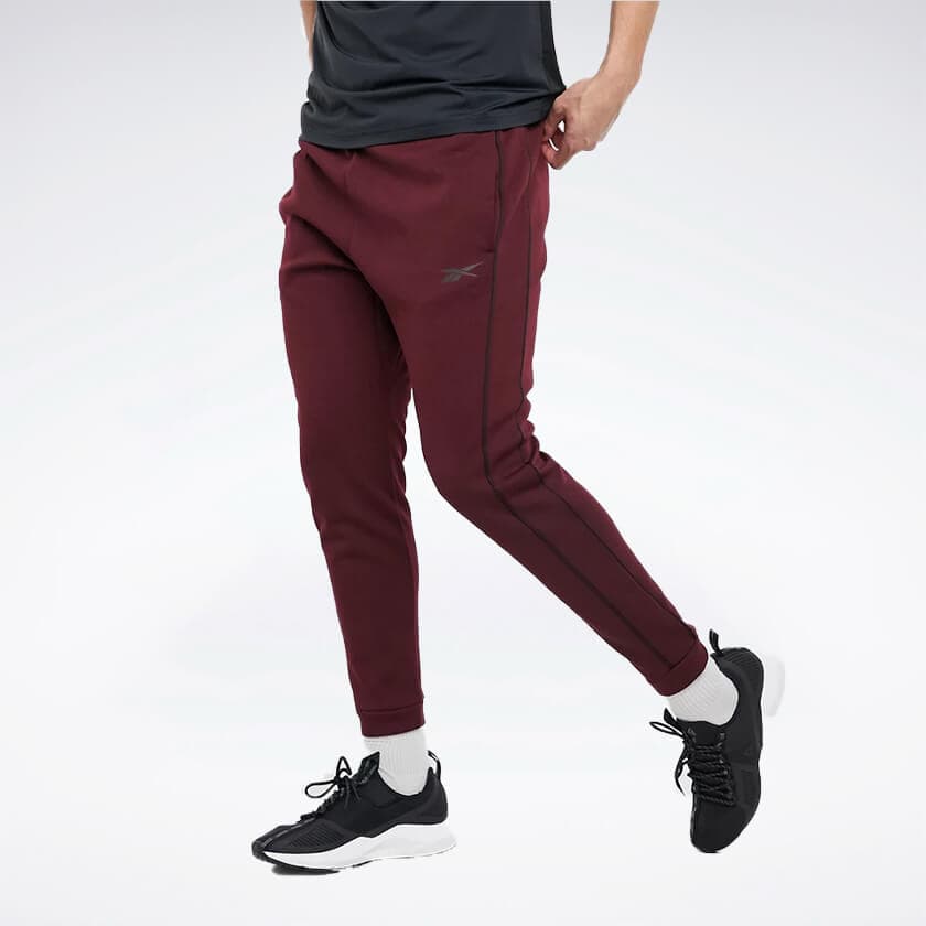 شلوار مردانه ریباک مدل Reebok Reebok Training Polyknit Sweatpants In Burgundy red FU3354 — تصویر ۲