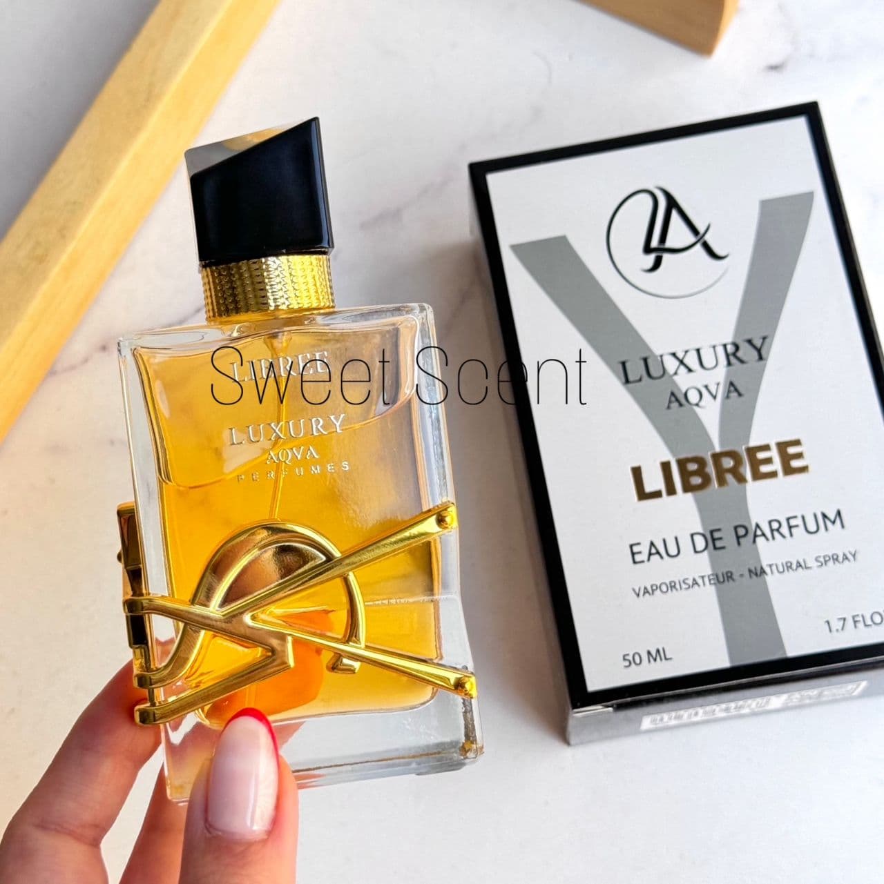 عطر و ادکلن زنانه ایو سن لورن لیبره (لیبر) لاکچری آکوا | Yves Saint Laurent Libre Luxury Aqva حجم 50 میل(شرکتی) — تصویر ۳