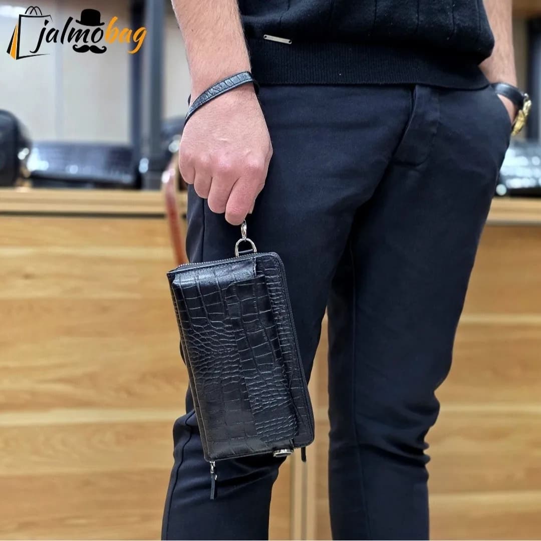 کیف دستی و دوشی چرم طبیعی ظفر دارای بند مچی و بند بلند قابل تنظیم — تصویر ۴