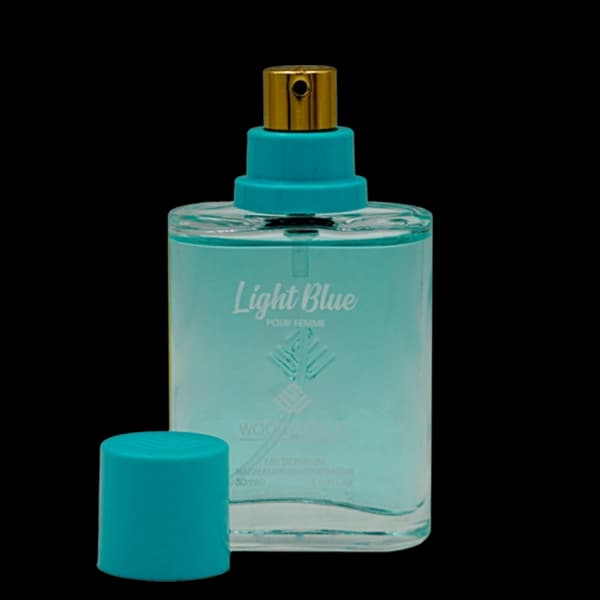 عطر جیبی زنانه وودی سنس مدل لایت بلو Light Blue حجم 30 میلی لیتر — تصویر ۲