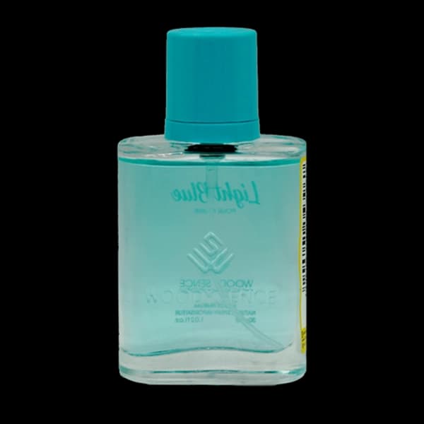 عطر جیبی زنانه وودی سنس مدل لایت بلو Light Blue حجم 30 میلی لیتر — تصویر ۳