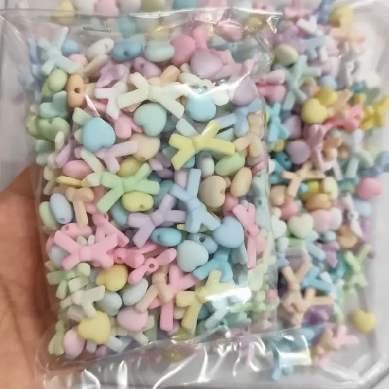 مهره رنگی طرح مخملی متنوع قلب و پاپیون(100گرم) — تصویر ۳