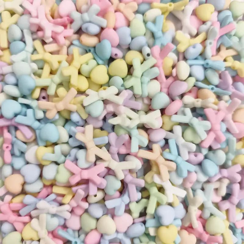 مهره رنگی طرح مخملی متنوع قلب و پاپیون(100گرم) — تصویر ۵